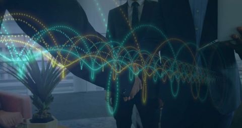 Businessmen shaking hands with digital connections overlay