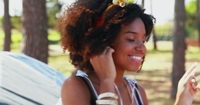 Carefree Woman Enjoying Music in Park - Download Free Stock Images Pikwizard.com