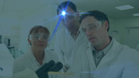 Team of Scientists Researching in Laboratory Environment