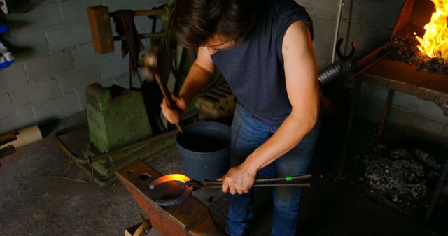 Blacksmith Forging Hot Metal in Traditional Workshop - Download Free Stock Images Pikwizard.com