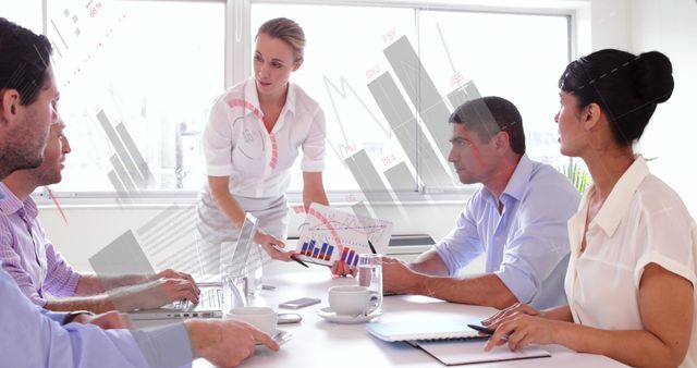 Business Meeting with Financial Presentation and Data Analysis in Modern Office - Download Free Stock Images Pikwizard.com