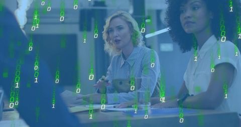 Discussing digital strategy: women leading data-driven meeting with binary code overlay