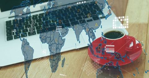 Global data visualization overlaying laptop and red coffee cup on wooden desk