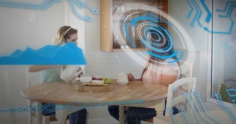 Pouring tea while wearing casual clothes, augmented reality hud overlay at kitchen table