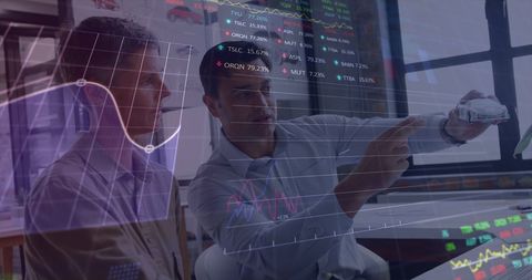 Engineers analyzing car model data with digital stock graphs