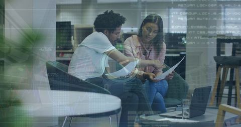 Collaborative Discussion in Modern Office with Digital Overlay