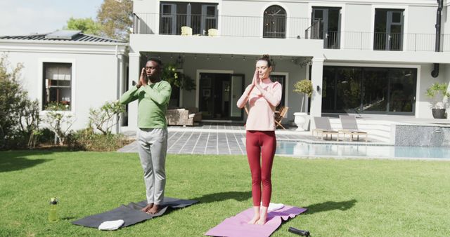 Couple Practicing Yoga in Backyard of Modern Home - Download Free Stock Images Pikwizard.com