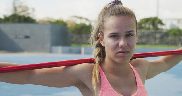 Young Female Athlete Training Outdoors with Pole - Download Free Stock Images Pikwizard.com