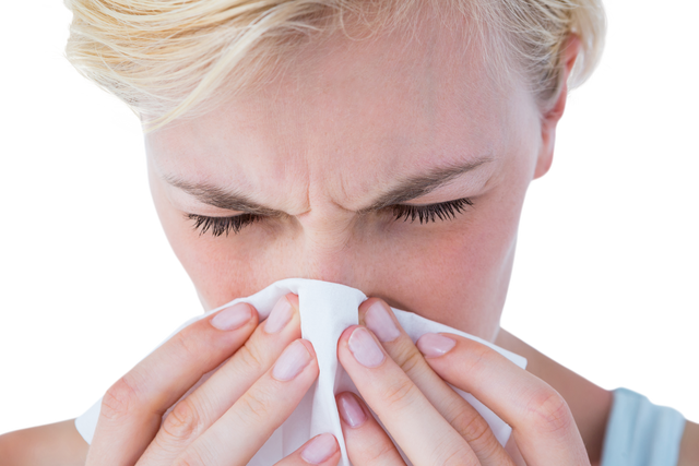 Close-up Transparent Image of Woman Blowing Nose with Tissue - Download Free Stock Videos Pikwizard.com