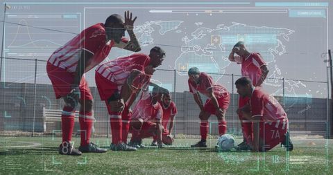 Futuristic interface over tired football players on field
