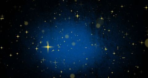Golden Sparkles on a Blurred Blue Background - Download Free Stock Images Pikwizard.com