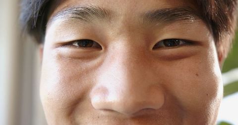 Close-Up Portrait Highlighting Natural Skin Texture and Radiance