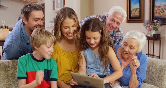 Multigenerational Family Having Fun with Digital Tablet at Home - Download Free Stock Images Pikwizard.com