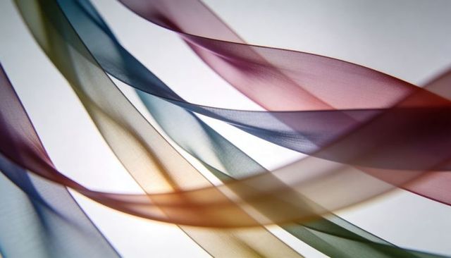 Backlit sheer ribbons drifting, pastel gradients creating soft abstract vertical background