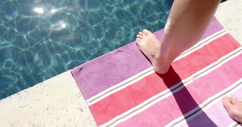 Relaxed Summer Day by the Pool with Colorful Towel - Download Free Stock Images Pikwizard.com