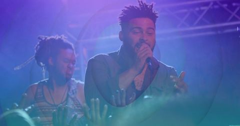 Energetic Live Concert Performance by Dynamic Duo