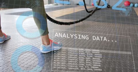 Digital interface over battle rope workout in gym