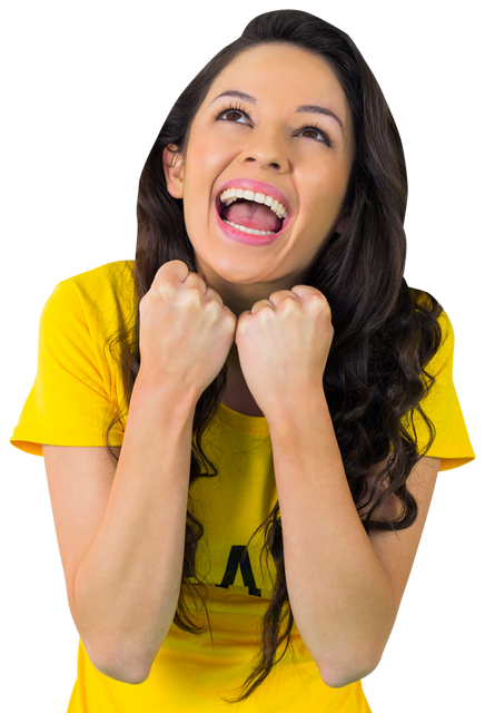 Excited Football Fan in Yellow Brazil T-Shirt Celebrating - Download Free Stock Videos Pikwizard.com