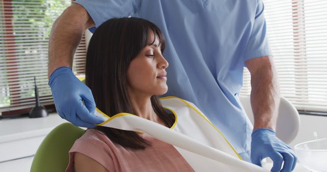 Dental Professional Preparing Woman for X-Ray Exam - Download Free Stock Images Pikwizard.com