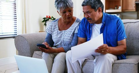 Financial Planning at Home for Middle-Aged Couple - Download Free Stock Images Pikwizard.com