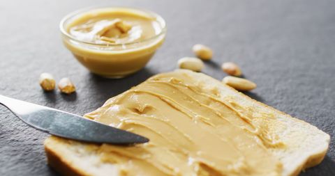 Delicious Toast with Creamy Peanut Butter on Plate - Download Free Stock Images Pikwizard.com