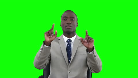 Businessman Interacting with Virtual Keyboard on Green Screen Background