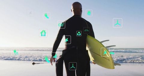 Surfer embracing environment with eco-friendly icons on beach