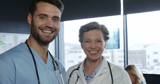 Smiling Doctors in Medical Office With Stethoscopes - Download Free Stock Images Pikwizard.com