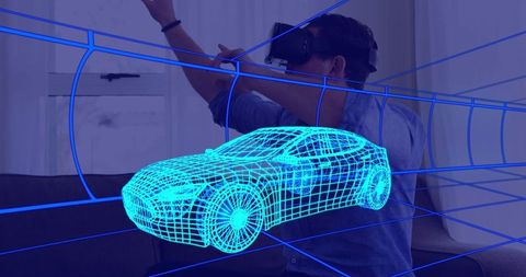 Man engaged with futuristic car design through virtual reality