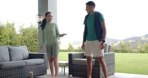 Friends Engaging in Outdoor Fitness and Relaxation Activities