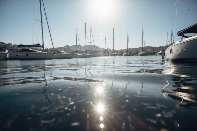 General view of port with sailing boats, sea and sunlight created using generative ai technology. Travel, sailing and seaside concept digitally generated image.