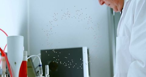 Senior scientist conducting laboratory experiments in advanced research facility