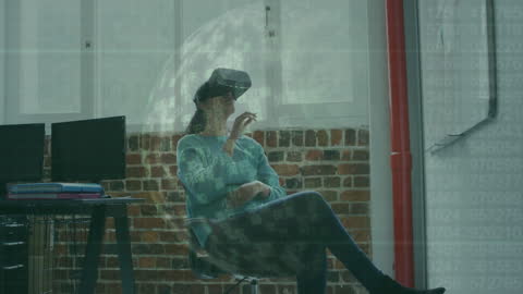 Technology Minded Businesswoman Using Virtual Reality in Modern Office