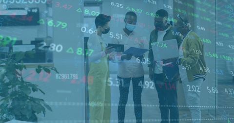 Diverse Team Discussing Financial Data with Technology Interface