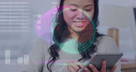 Smiling Professional Analyzing Real-Time Data on Tablet