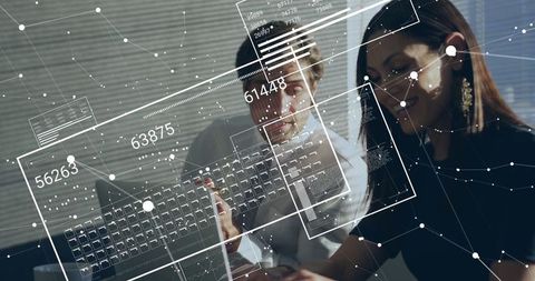 Office professionals reviewing digital data with floating overlay panels