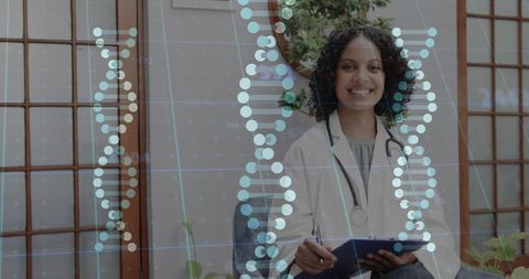 Smiling Doctor Analyzing DNA Data in Futuristic Interface