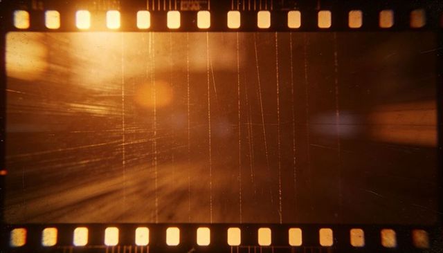 Displaying 35mm film frame with sprocket holes, light leaks, scratches and sepia grain