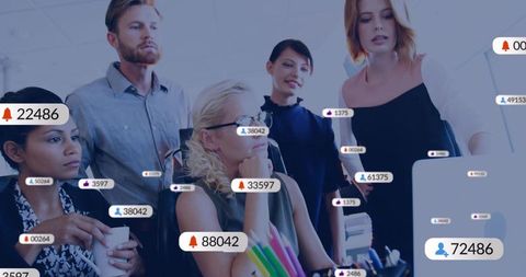 Coworkers Collaborating in Modern Office with Digital Analytics
