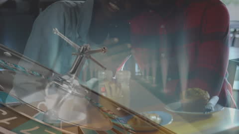 Couple Enjoys Relaxing Bistro Visit with Roulette Overlay