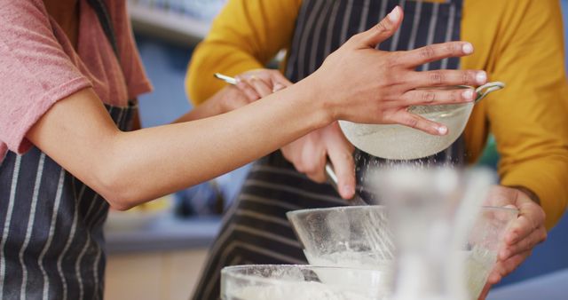 Hands Sifting Flour Together in Modern Kitchen - Download Free Stock Images Pikwizard.com