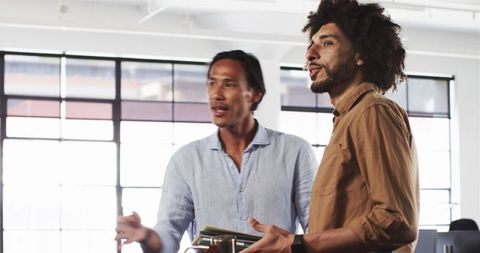 Businessmen Collaborating in Office Environment
