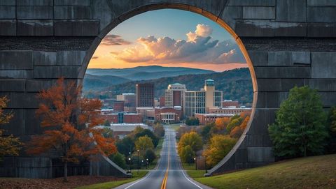 Circular city view through stone archway in autumn through arch, knoxville concept