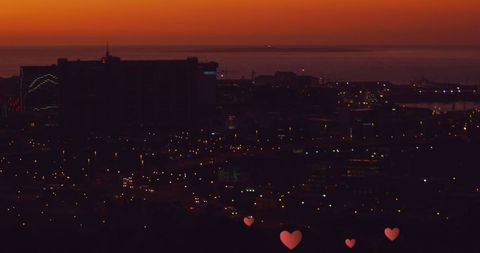 Heart-Shaped Lights Over Twilight Urban Skyline Love Symbol - Download Free Stock Images Pikwizard.com