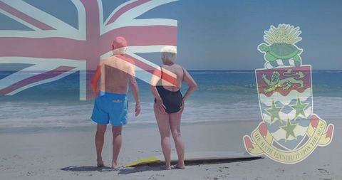 Senior couple enjoying serene beach vacation with nautical flag overlay