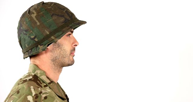 Serious Soldier in Camouflage and Helmet Facing Right - Download Free Stock Images Pikwizard.com