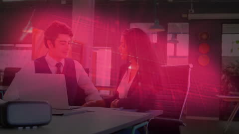 Business Colleagues Analyzing Dynamic Graphs in Modern Office