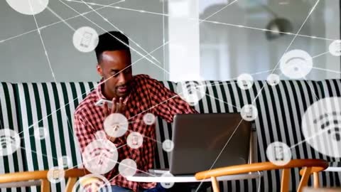 Man Navigating Digital Workspace with Smartphone in Modern Lounge