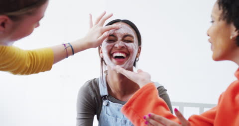 Joyful Teens Enjoying Skincare Routine Together