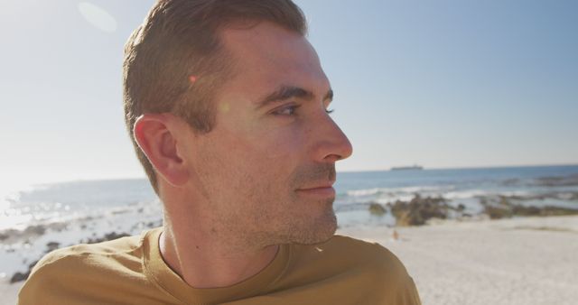 Close-Up of Man Relaxing at the Beach on a Sunny Day - Download Free Stock Images Pikwizard.com